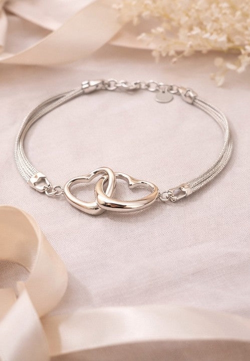 Pulsera corazones enlazados