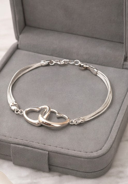 Pulsera corazones enlazados