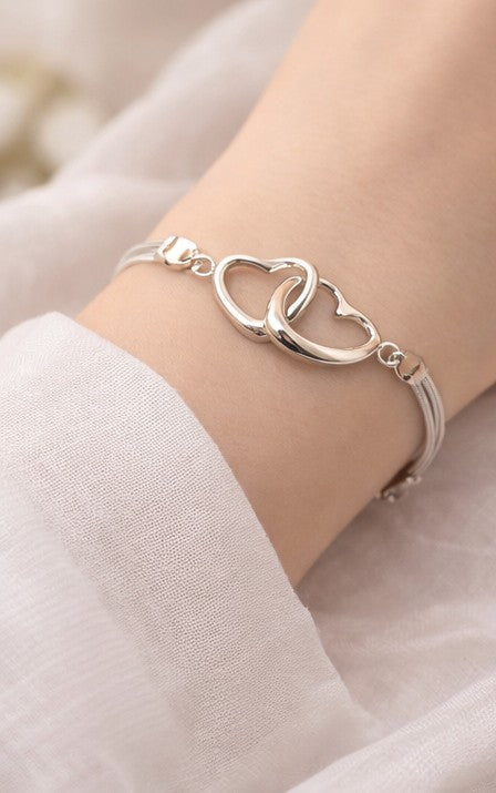 Pulsera corazones enlazados